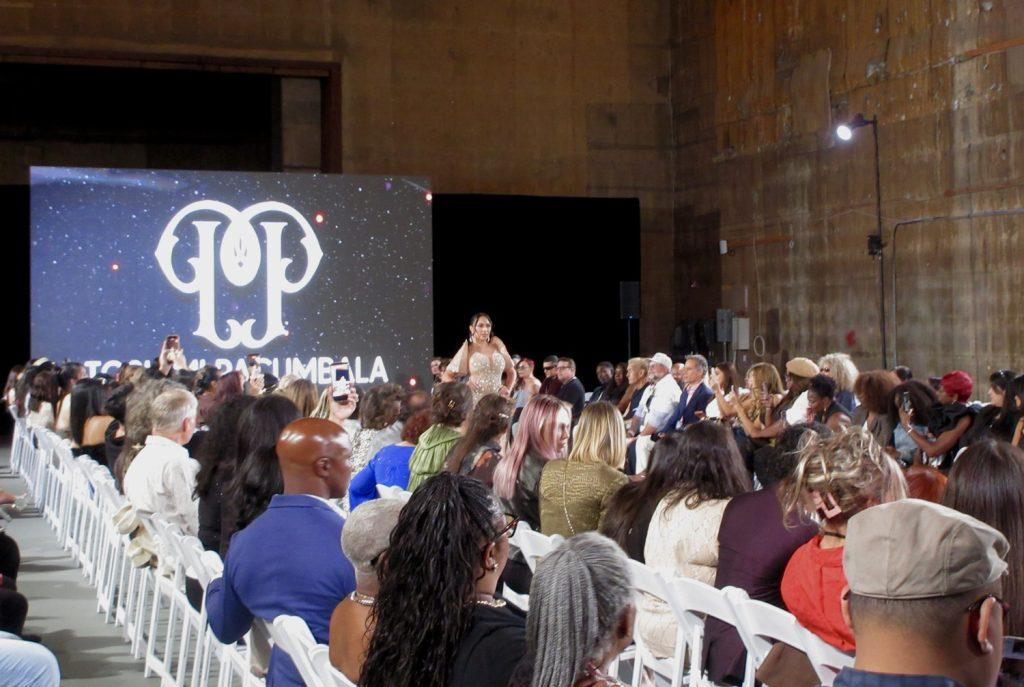 A Toshimi Pacumbala Atelier look opens the runway at Los Angeles Fashion Week, October 2026